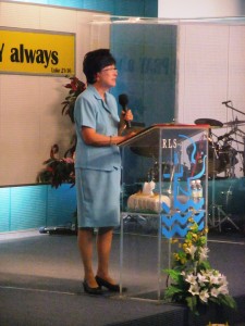 Mrs Ang teaching at T Net before the Service