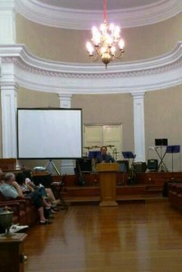 Pastor Amos preaching Pastor Amos preaching