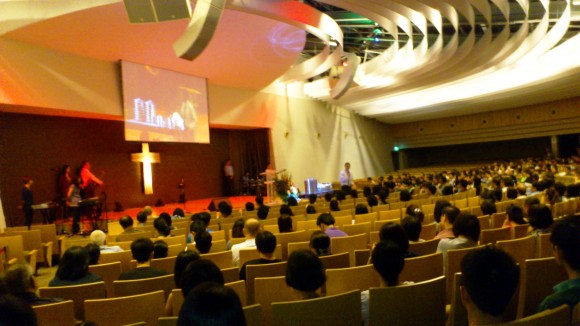 Pastor Edward presiding over communion