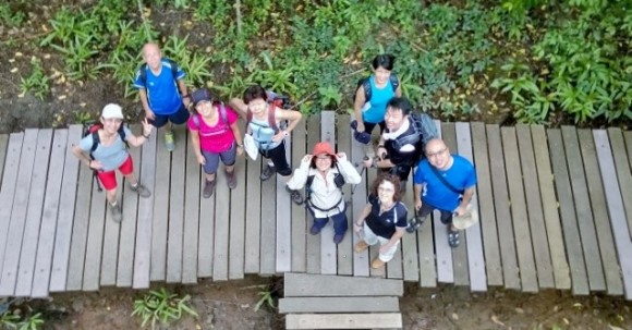 Looking down at friends from the tower at Chek Jawa