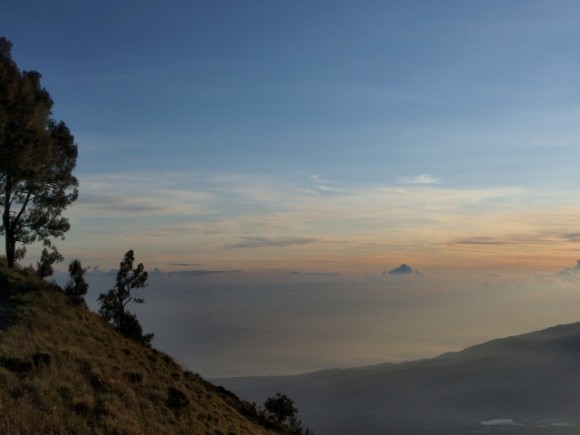 The skies sing a slow song to awaken the mountains