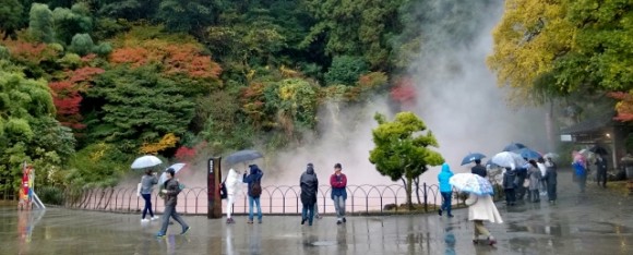 It was wet at the volcanic ponds - reddish brown hot water and mud