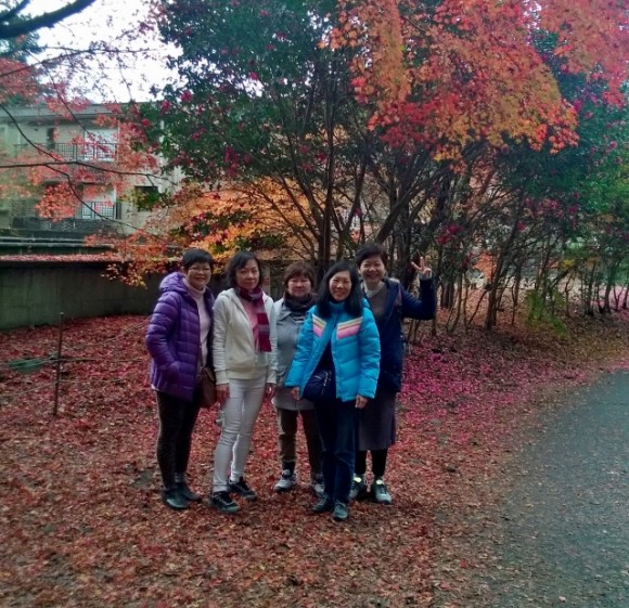 Ladies with autumn colours in the background