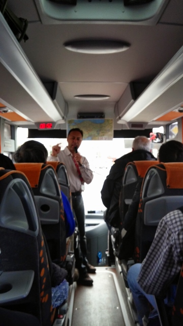 20150409_084508~2 (360x640) Sela, boss of tour company humouring us in the bus