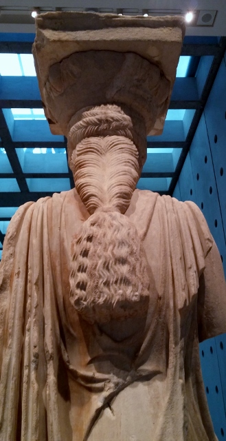 Admiring ladies hairstyles in the Acropolis Museum, Athens