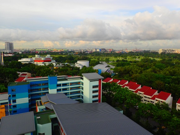 Jurong Country Club and Science Centre and the green belt beyond the foreground of a school. 