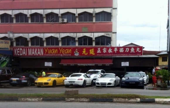 Singapore plated Porches parked in front of the shop makes for good advertisement
