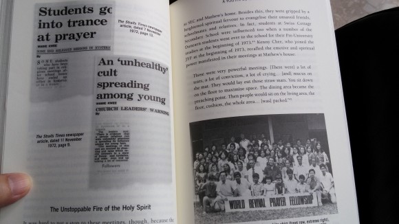 The book with photographs of the newspaper stories of speaking in tongues among students and several WRPF photos is inside