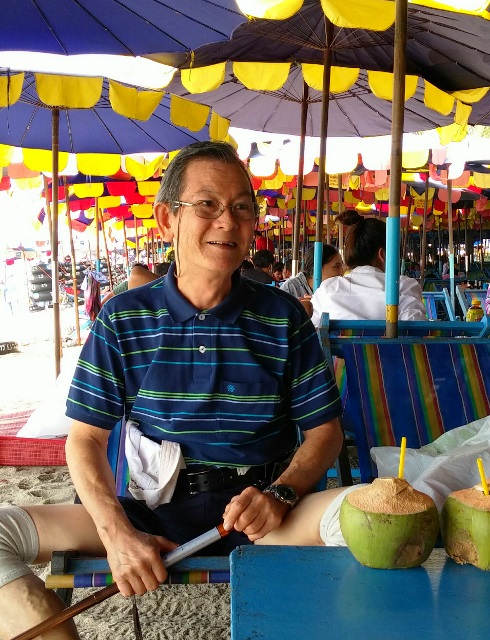 Simeon Poh enjoying the coconut juice