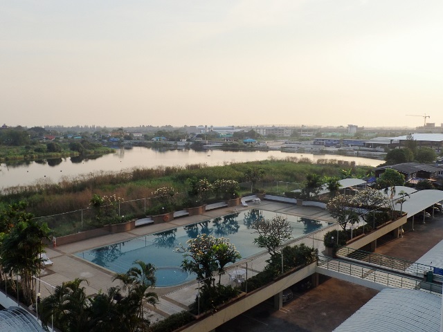 A tiny lake sits outside the pool