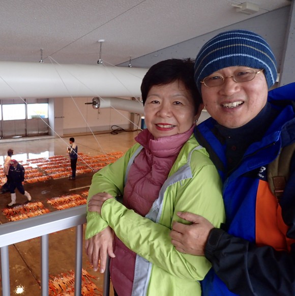 The viewing gallery was a long balcony 20 feet above the warehouse floor